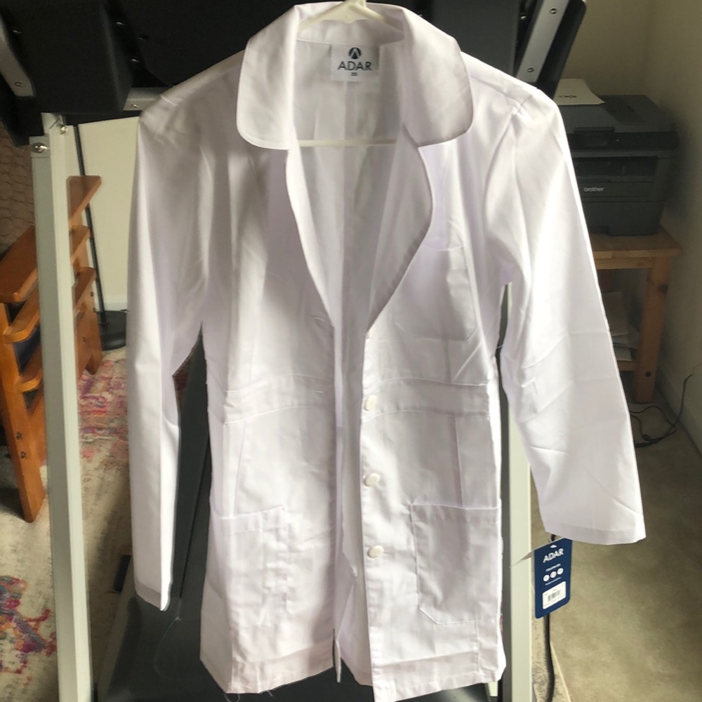 Never worn. Women’s lab coat sz xs
